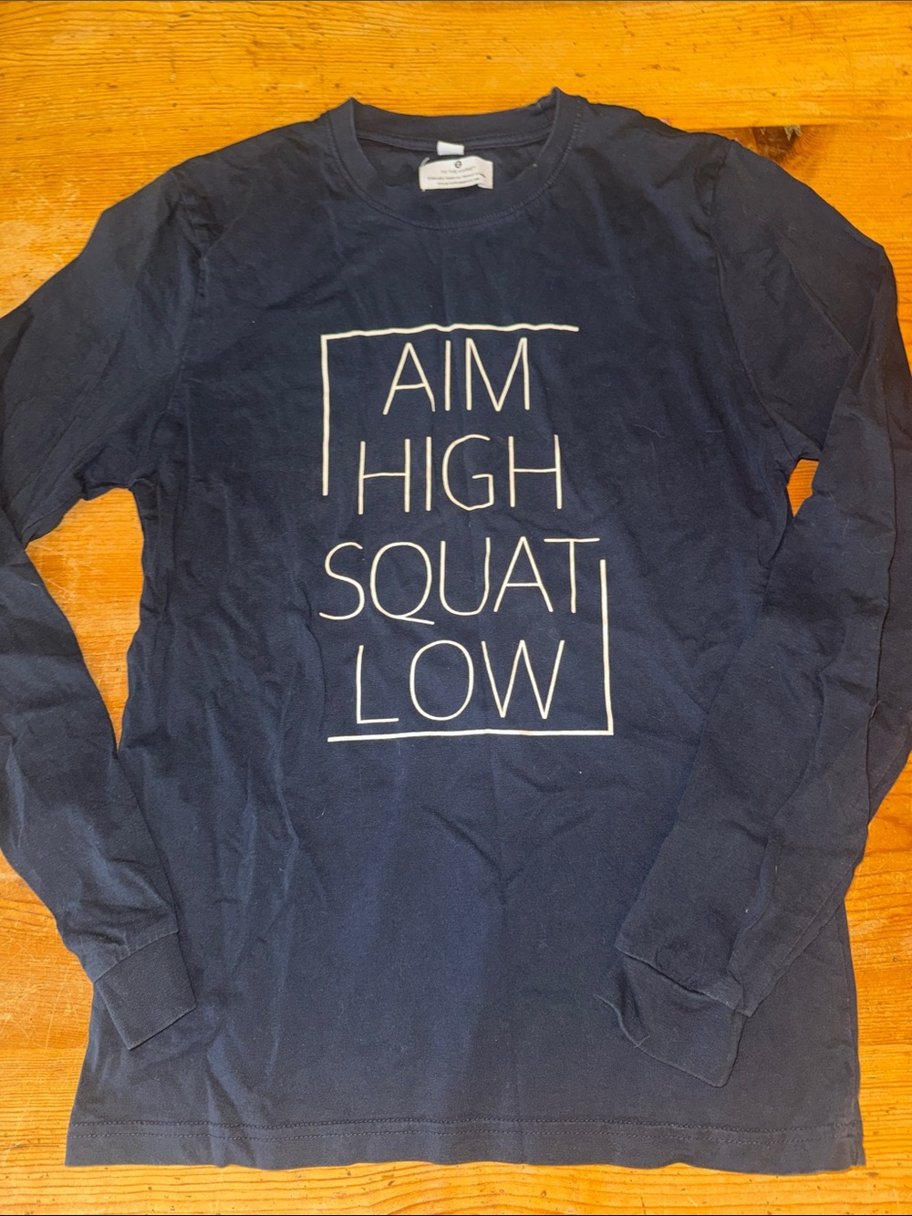 Navy Long Sleeve Tee with "AIM HIGH SQUAT LOW" Graphic